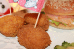 ricetta antipasti Natale 2015 veloci e sfiziosi arancini di riso ripieni speck scamorza bianca